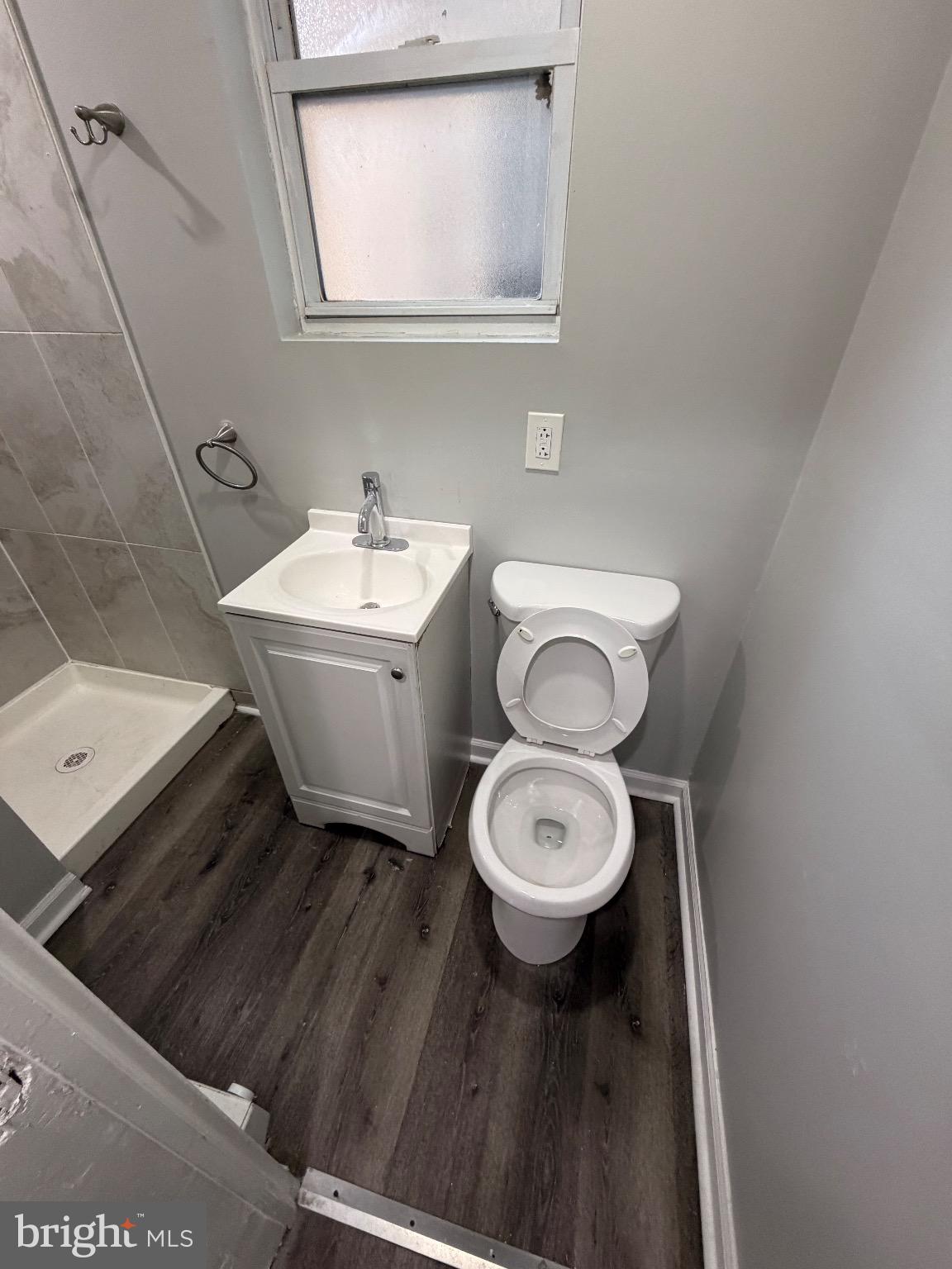 41 North Keystone Avenue Upper Darby, PA 19082 - Photo 10 of 15 a bathroom with a toilet sink and mirror