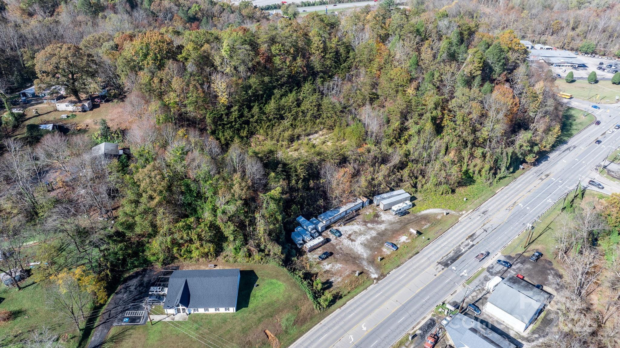 1965 North Main Street Marion, NC 28752 - Photo 11 of 23 an aerial view of a house with a yard