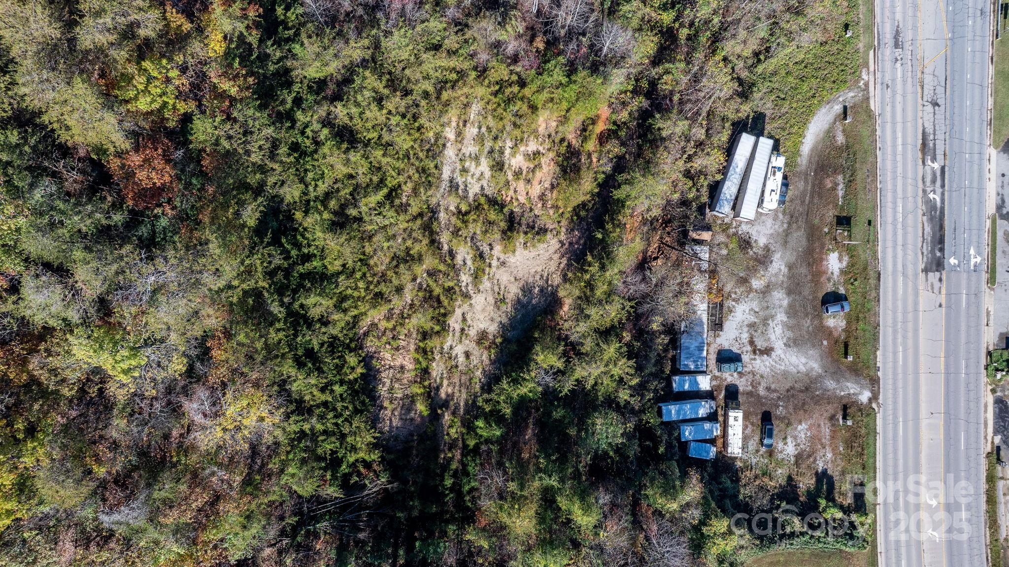1965 North Main Street Marion, NC 28752 - Photo 9 of 23 a view of a city with tall trees