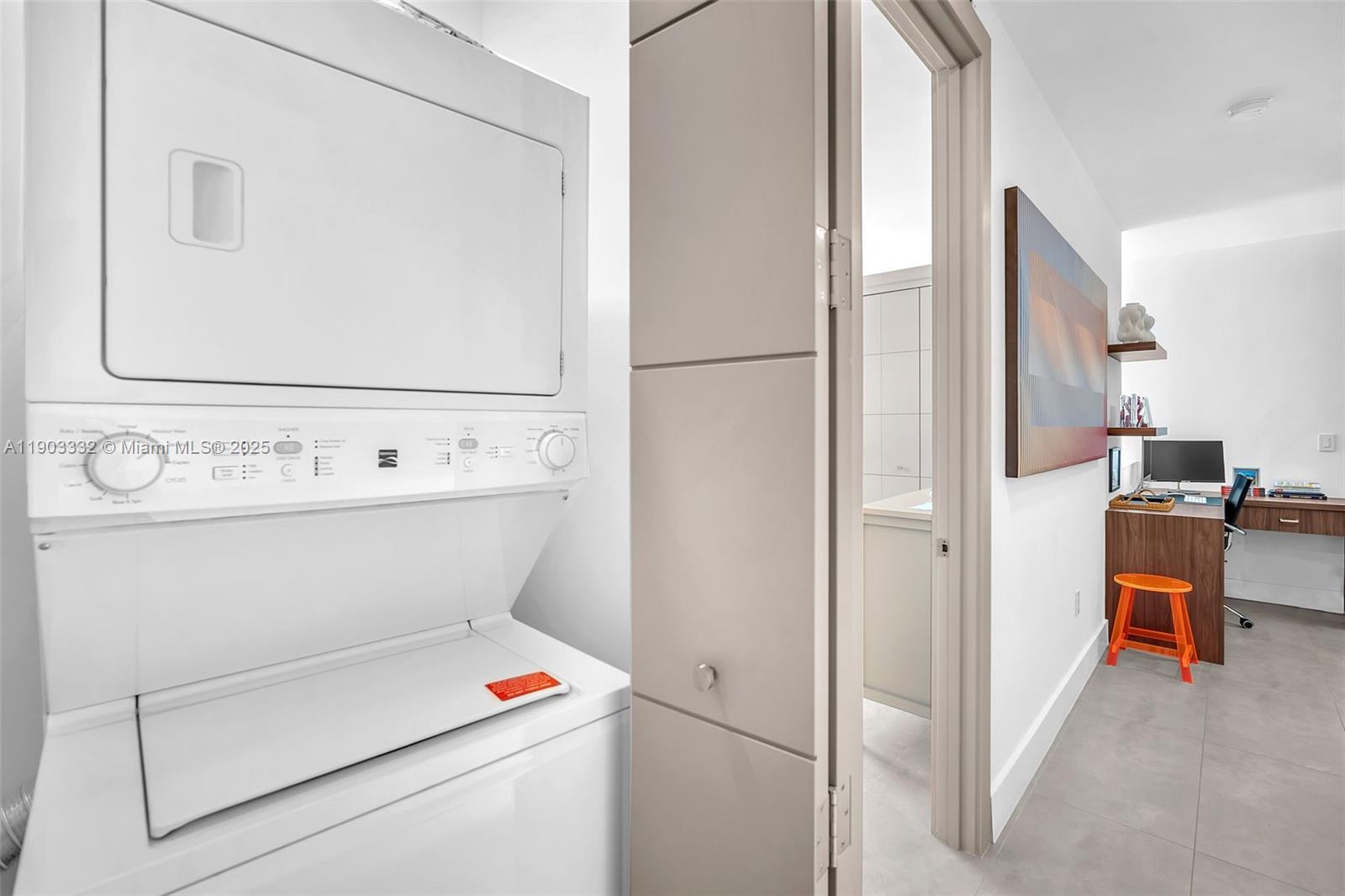 3167 Southwest 25th Street, Unit 1 Miami, FL 33133 - Photo 22 of 42 a utility room with dryer and washer