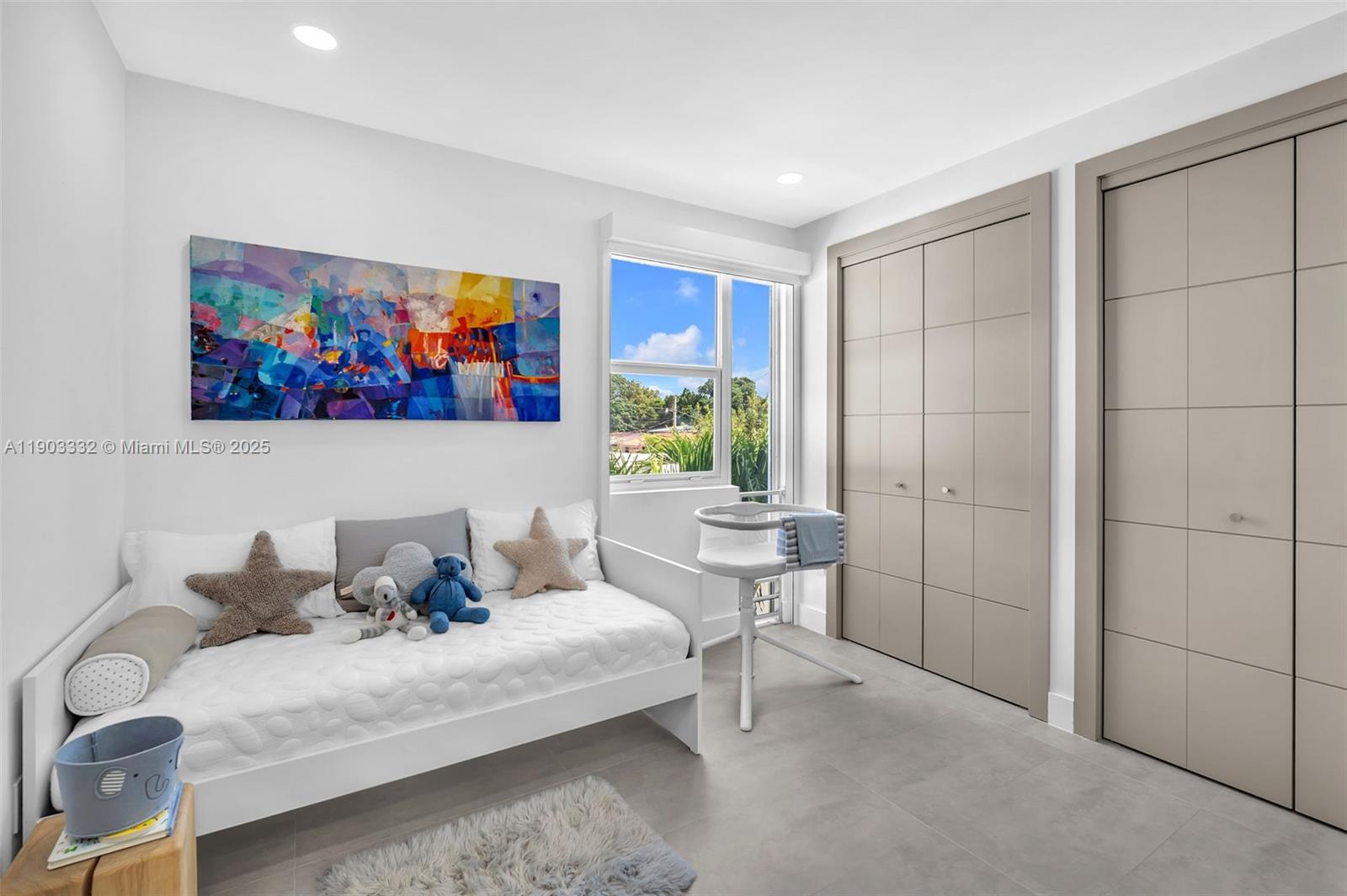 3167 Southwest 25th Street, Unit 1 Miami, FL 33133 - Photo 23 of 42 a living room with furniture and a painting on the wall