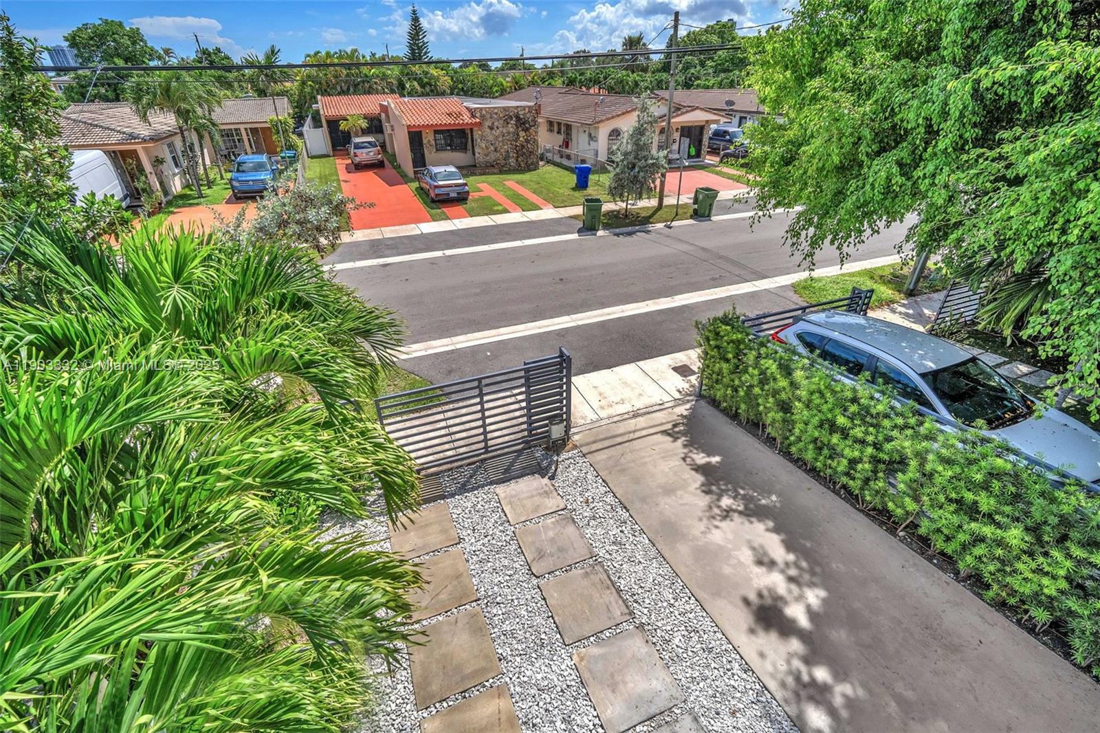 3167 Southwest 25th Street, Unit 1 Miami, FL 33133 - Photo 29 of 42 a view of a city with lots of trees