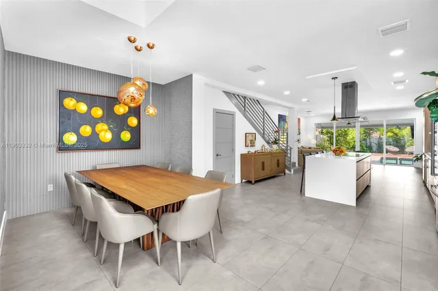 a view of kitchen and dining area with furniture