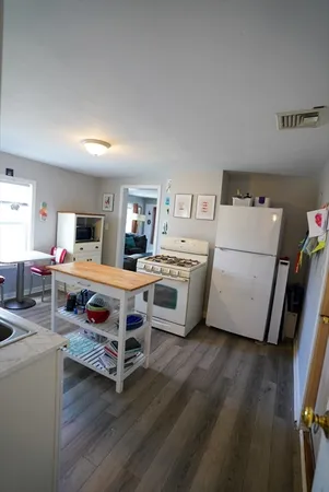 a room with furniture and a flat screen tv