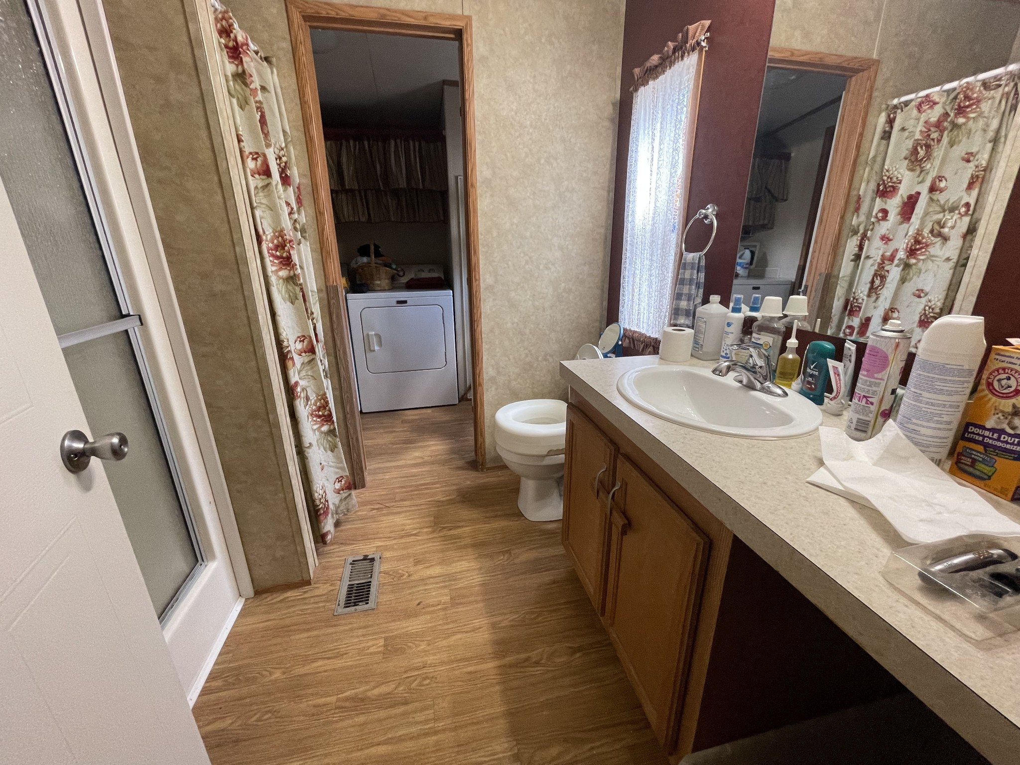 3556 Goshen Road Santa Fe, TN 38482 - Photo 13 of 22 a bathroom with a sink a toilet a mirror and shower