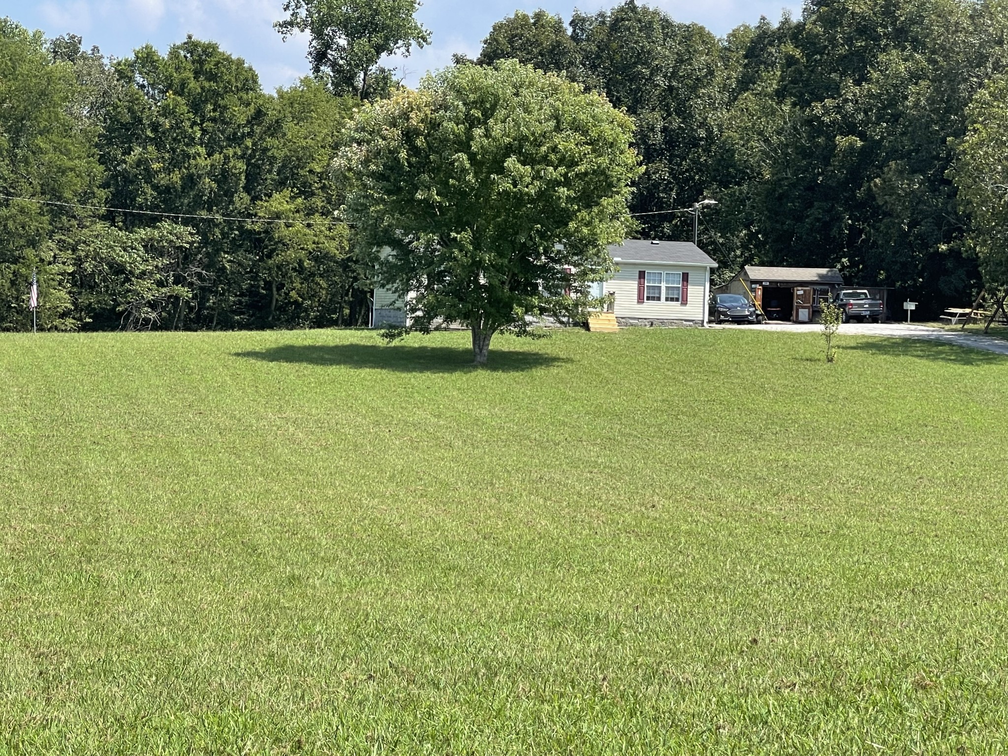 3556 Goshen Road Santa Fe, TN 38482 - Photo 19 of 22 a front view of a house with a yard