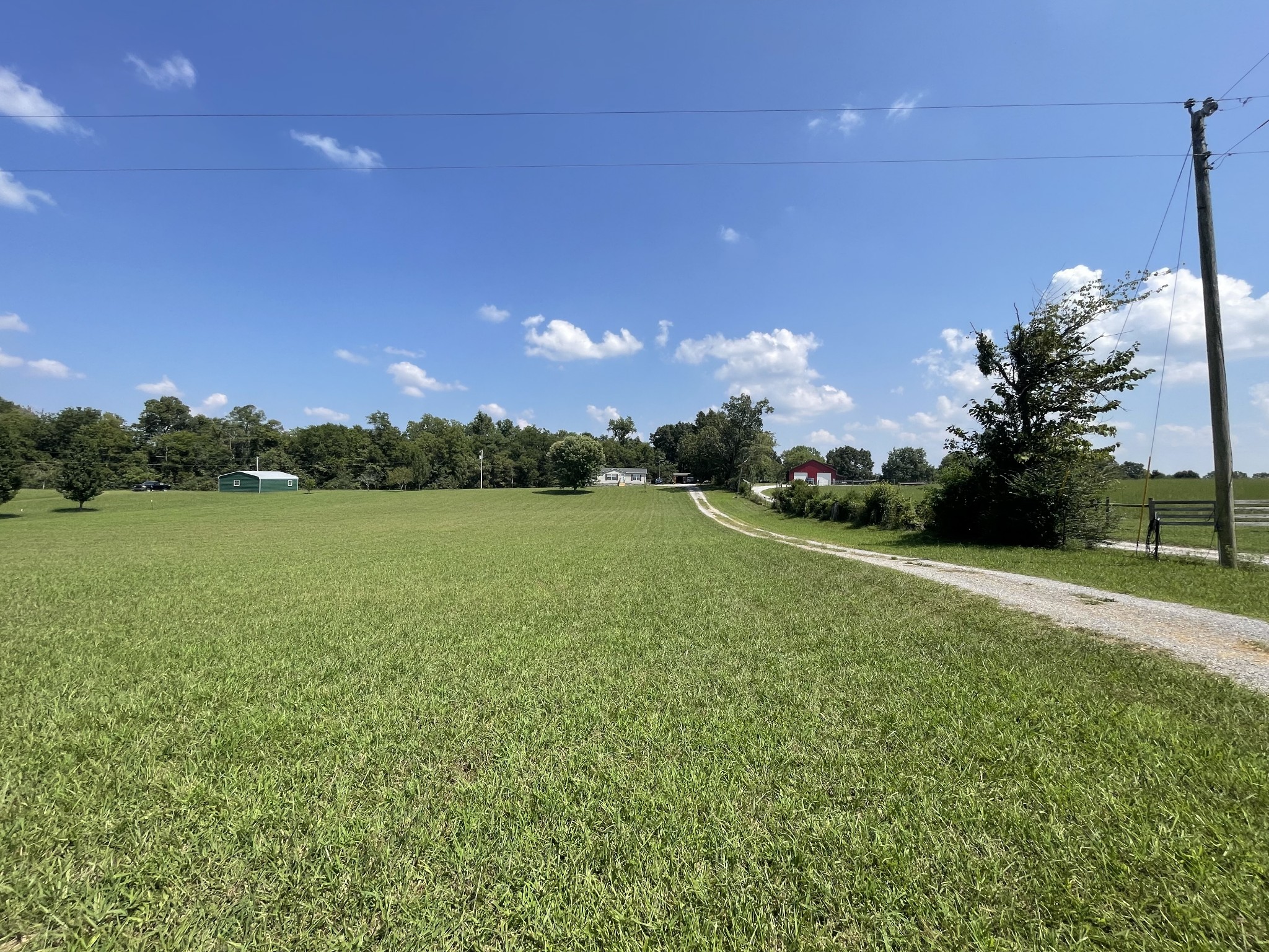 3556 Goshen Road Santa Fe, TN 38482 - Photo 20 of 22 a view of a lake with a big yard