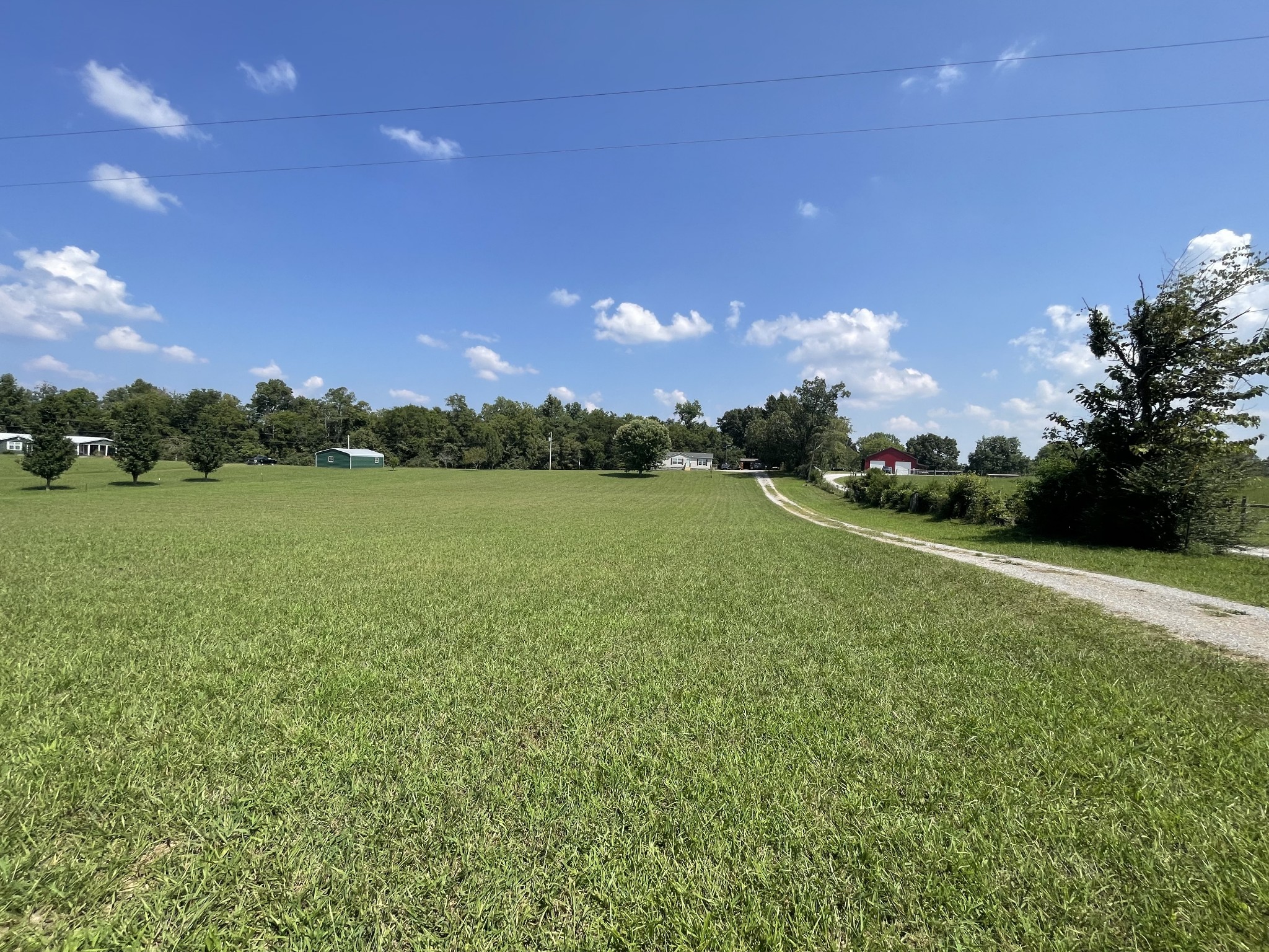 3556 Goshen Road Santa Fe, TN 38482 - Photo 2 of 22 a view of a golf course with a lake