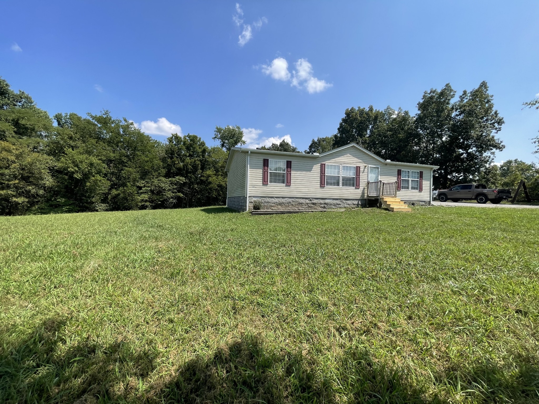 3556 Goshen Road Santa Fe, TN 38482 - Photo 22 of 22 a view of a house with a big yard