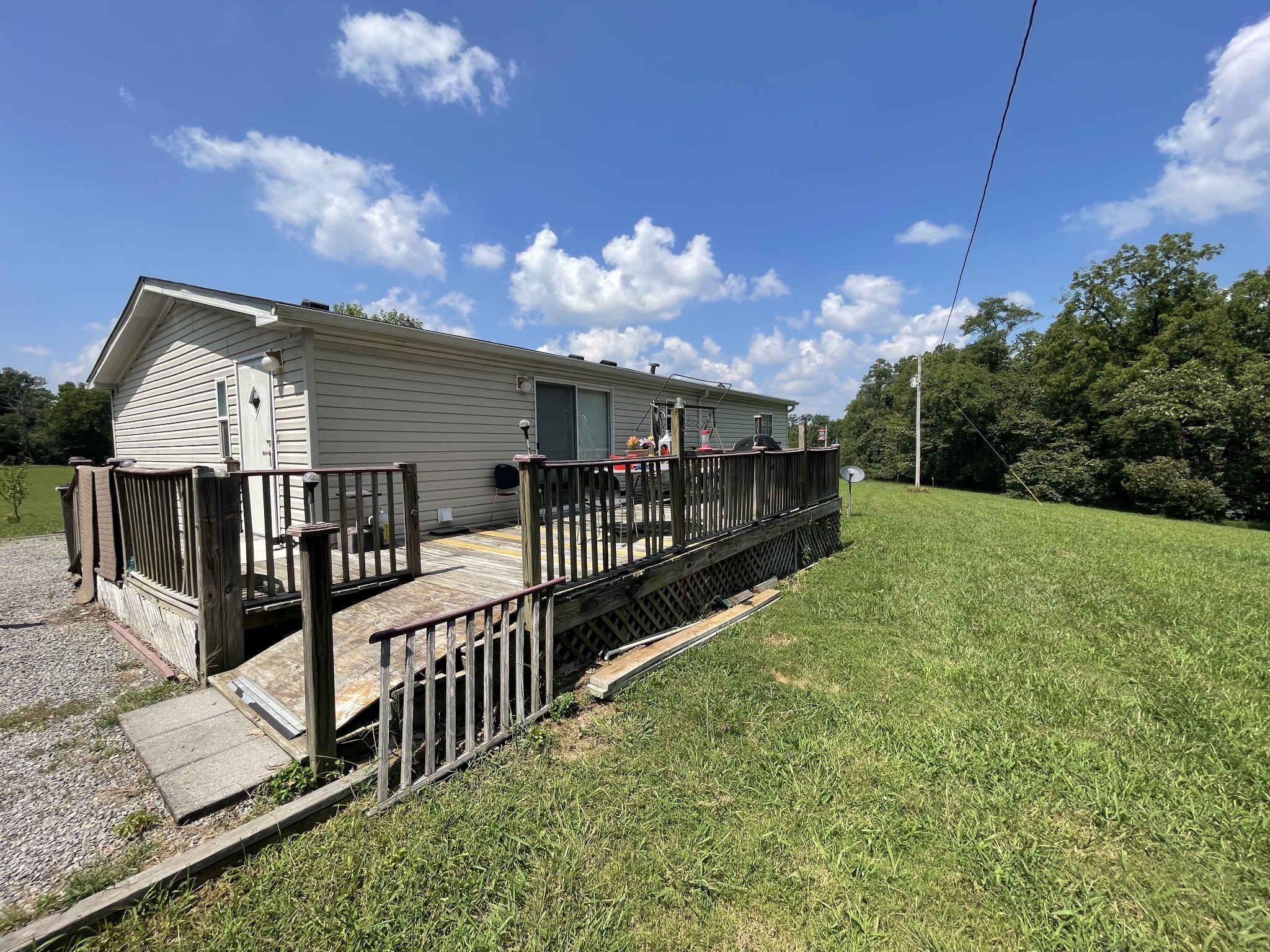 3556 Goshen Road Santa Fe, TN 38482 - Photo 5 of 22 a view of a house with wooden fence