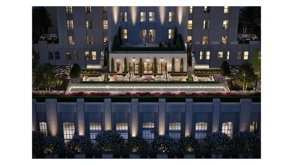 a view of living room with furniture and chandelier