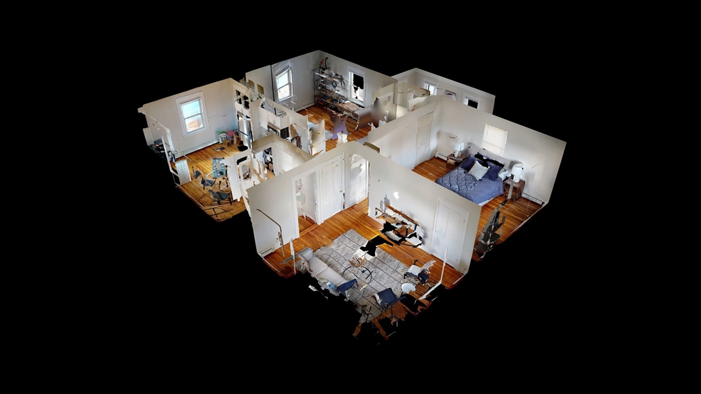 9 Winship Street, Unit 3 Boston, MA 02135 - Photo 10 of 10 an aerial view of a house with table and chairs