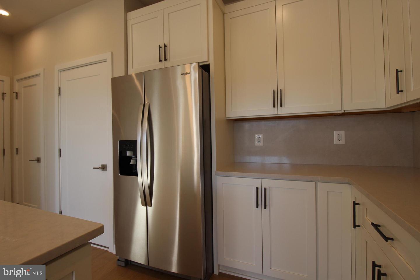 22383 Roanoke Rise Terrace Ashburn, VA 20148 - Photo 11 of 41 a view of a kitchen with refrigerator and cabinet