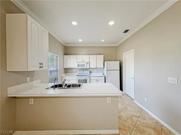 $1,749 | 906 Alfreda Avenue, Lehigh Acres, FL 33971