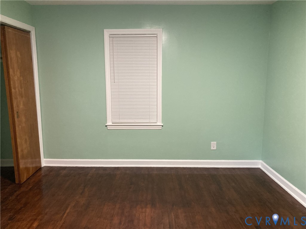3003 Burge Street Hopewell, VA 23860 - Photo 13 of 30 a view of a room with wooden floor and windows