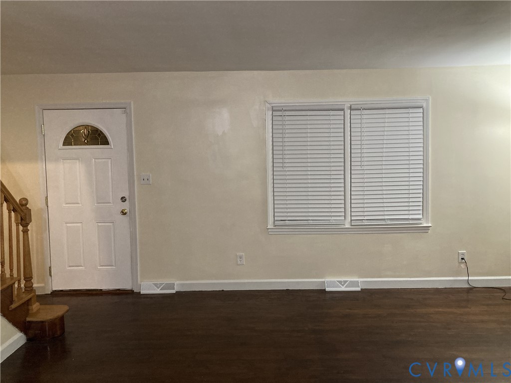 3003 Burge Street Hopewell, VA 23860 - Photo 16 of 30 an empty room with wooden floor and windows