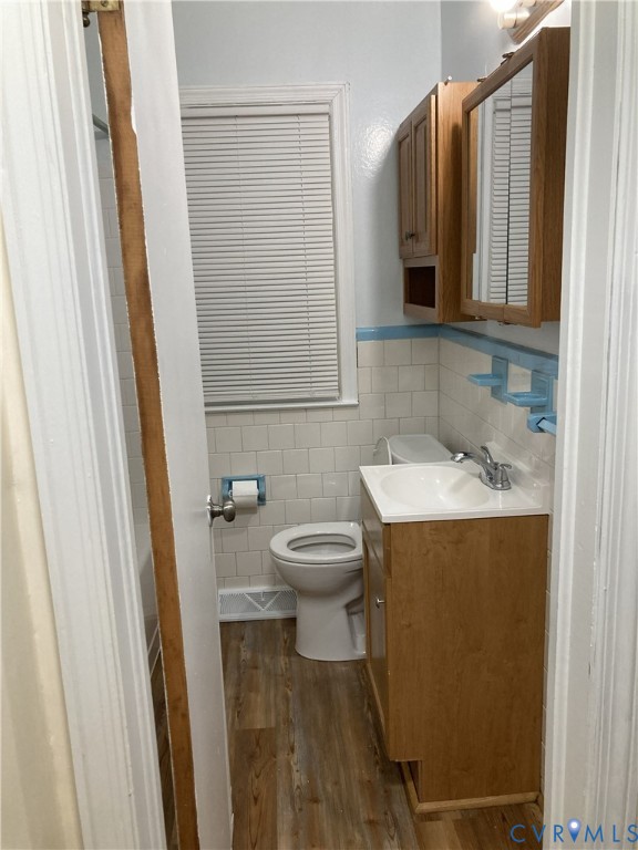 3003 Burge Street Hopewell, VA 23860 - Photo 28 of 30 a bathroom with a sink and a mirror