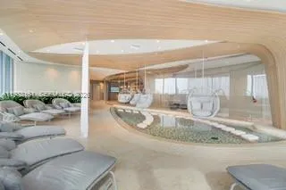 a view of a living room and a kitchen