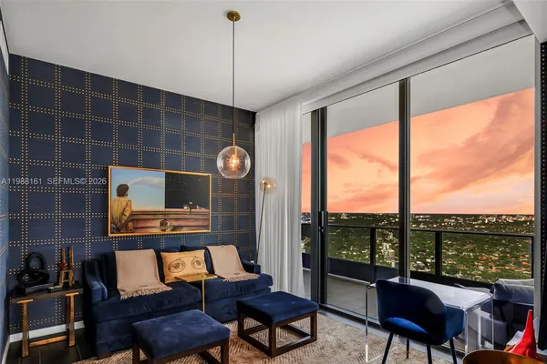 a view of a livingroom with furniture