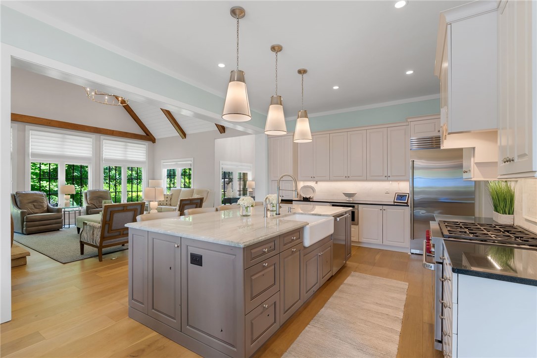 119 Drewberry Lane Sunset, SC 29685 - Photo 6 of 42 Bright and open, this expansive kitchen and living area offers seamless entertaining.