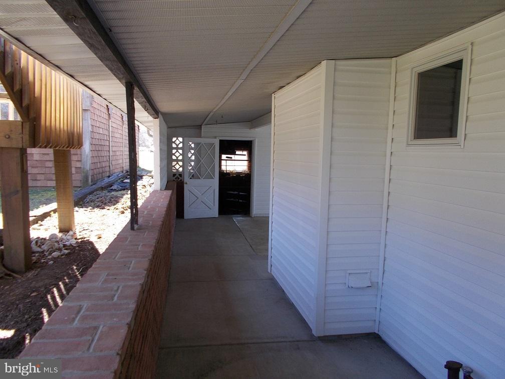 14807 Daley Road Hagerstown, MD 21740 - Photo 3 of 37 REAR COVERED PORCH