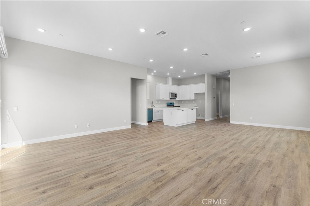 1341 East 8th Street Beaumont, CA 92223 - Photo 16 of 38 a view of kitchen with wooden floor