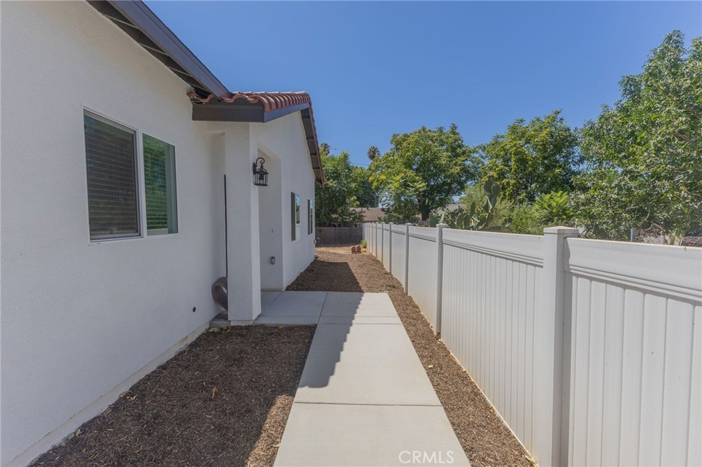 1341 East 8th Street Beaumont, CA 92223 - Photo 35 of 38 a view of a house with a pathway