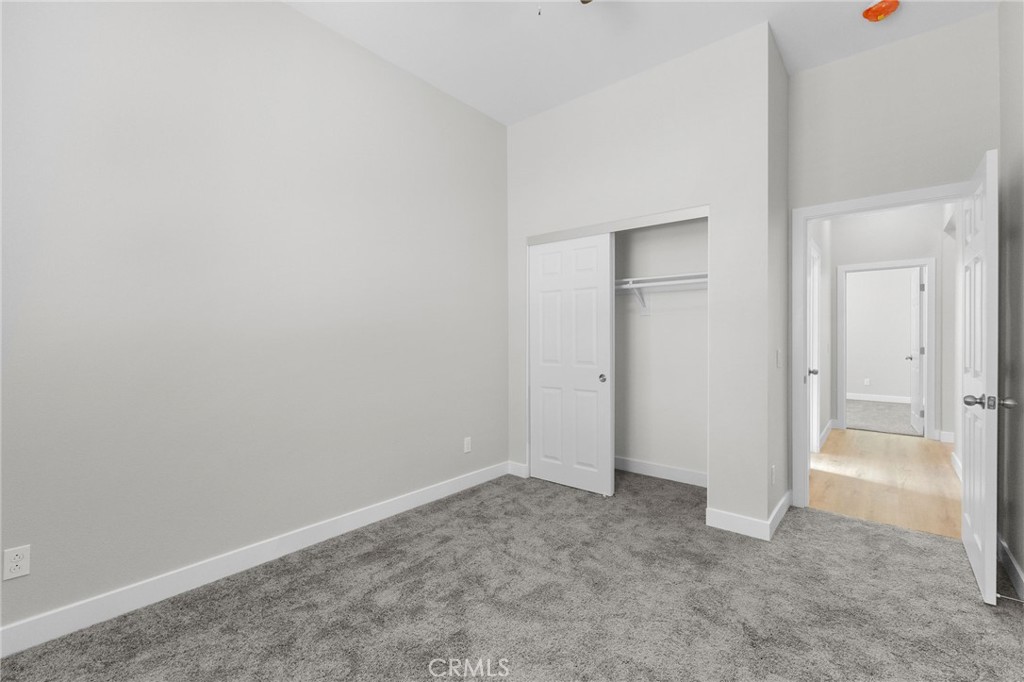 1341 East 8th Street Beaumont, CA 92223 - Photo 9 of 38 an empty room with an entryway