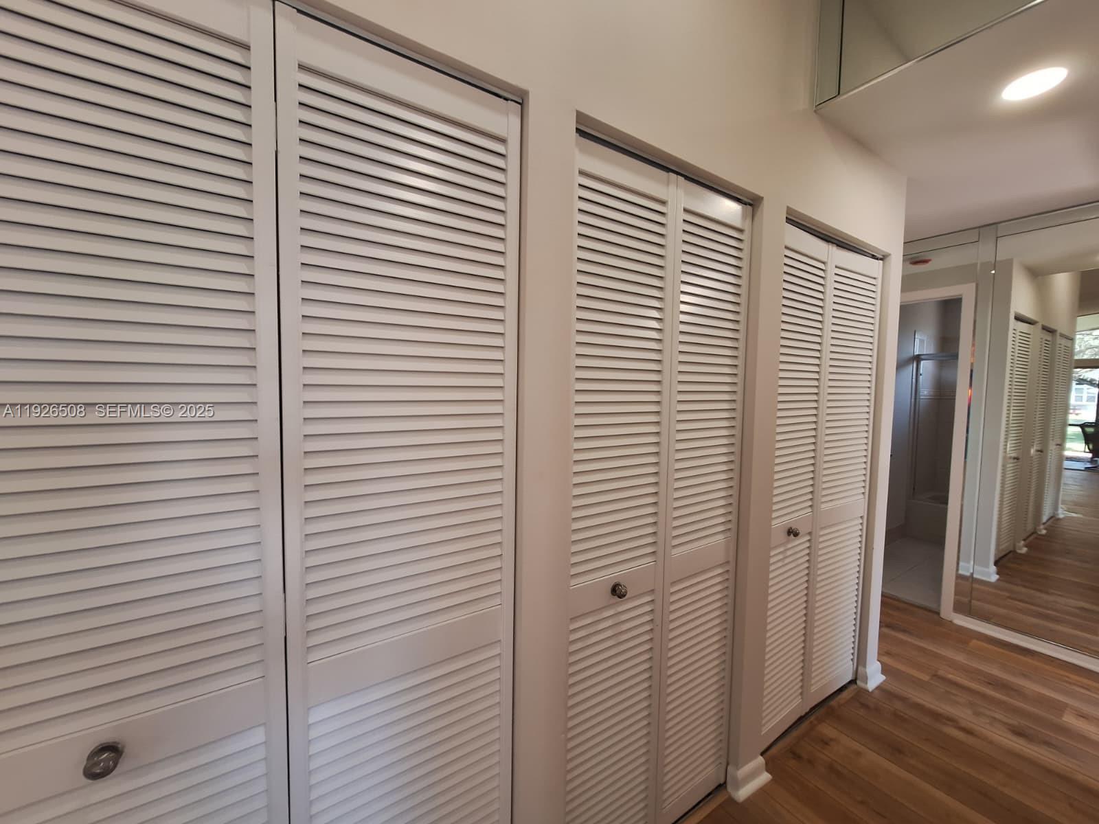 22295 Timberly Drive, Unit 22295 Boca Raton, FL 33428 - Photo 18 of 68 a view of a room with wooden floor