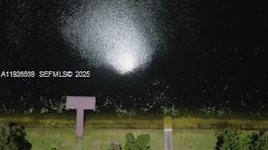 22295 Timberly Drive, Unit 22295 Boca Raton, FL 33428 - Photo 66 of 68 a swimming pool with outdoor seating and yard