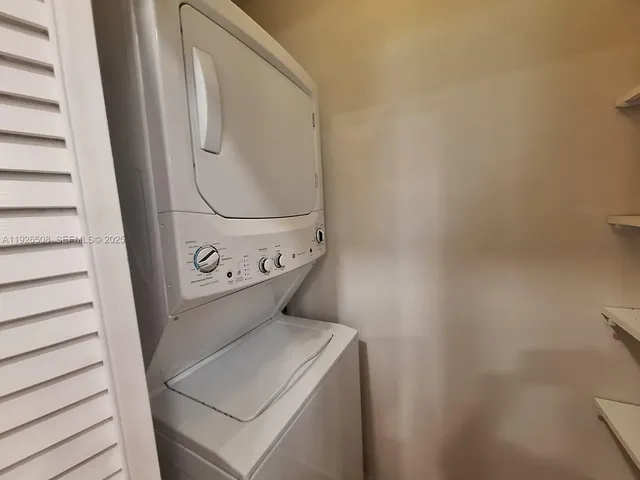 a view of room with racks on the wall