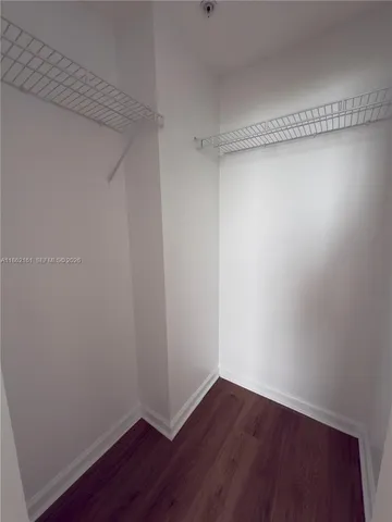 a view of a room with racks on the wall