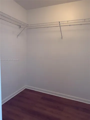 a bathroom with a sink toilet tub and shower