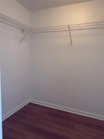 a bathroom with a sink toilet tub and shower