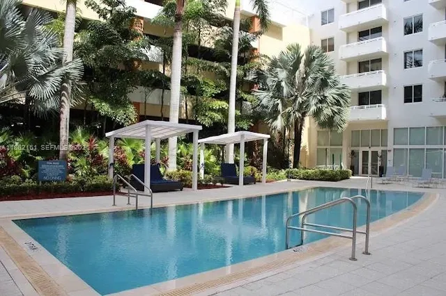 a large room with lots of table and chairs