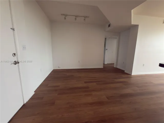 a kitchen with a refrigerator stove and microwave