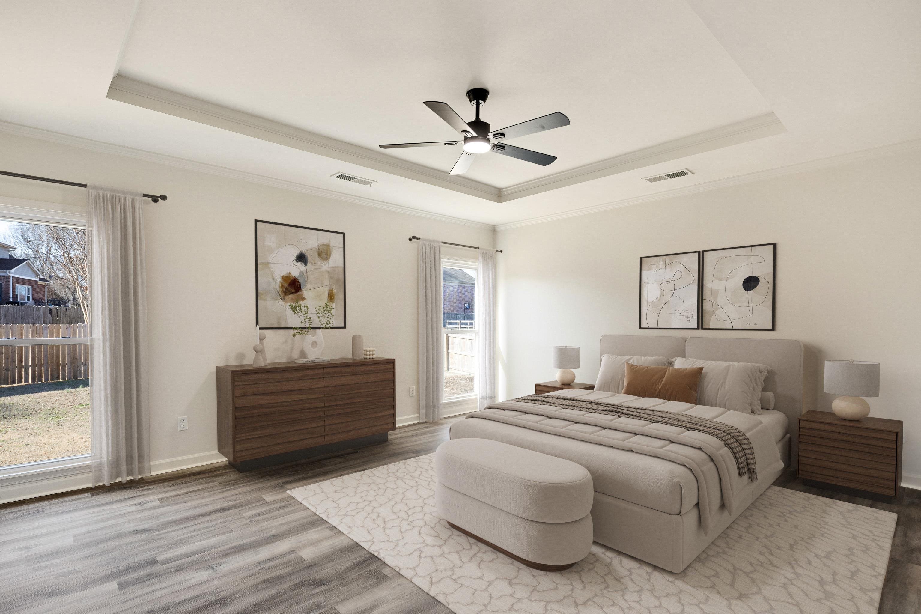 939 Fallen Oaks Drive Collierville, TN 38017 - Photo 12 of 23 a bedroom with a bed and a painting on the wall