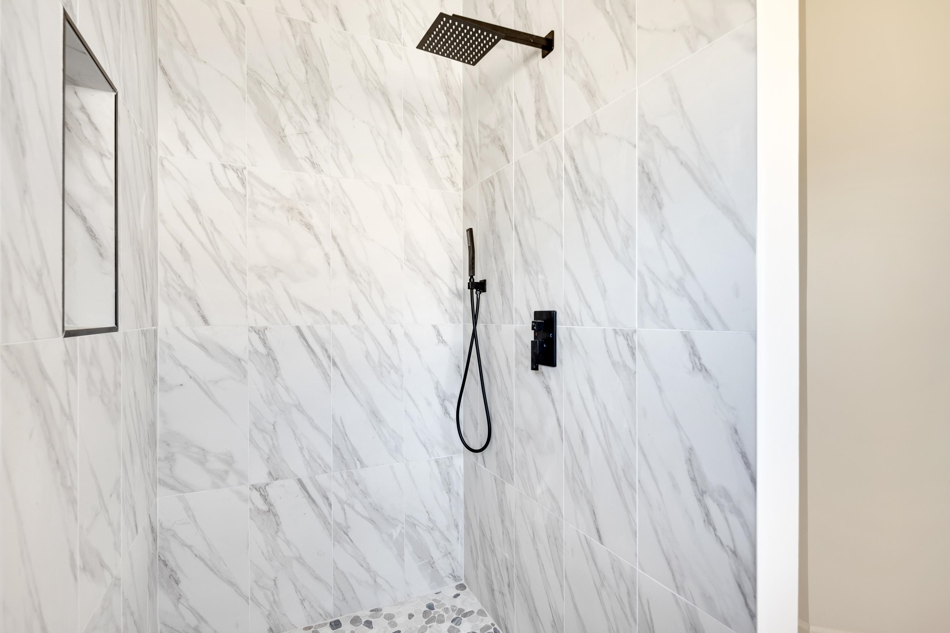 939 Fallen Oaks Drive Collierville, TN 38017 - Photo 14 of 23 a bathroom with a shower