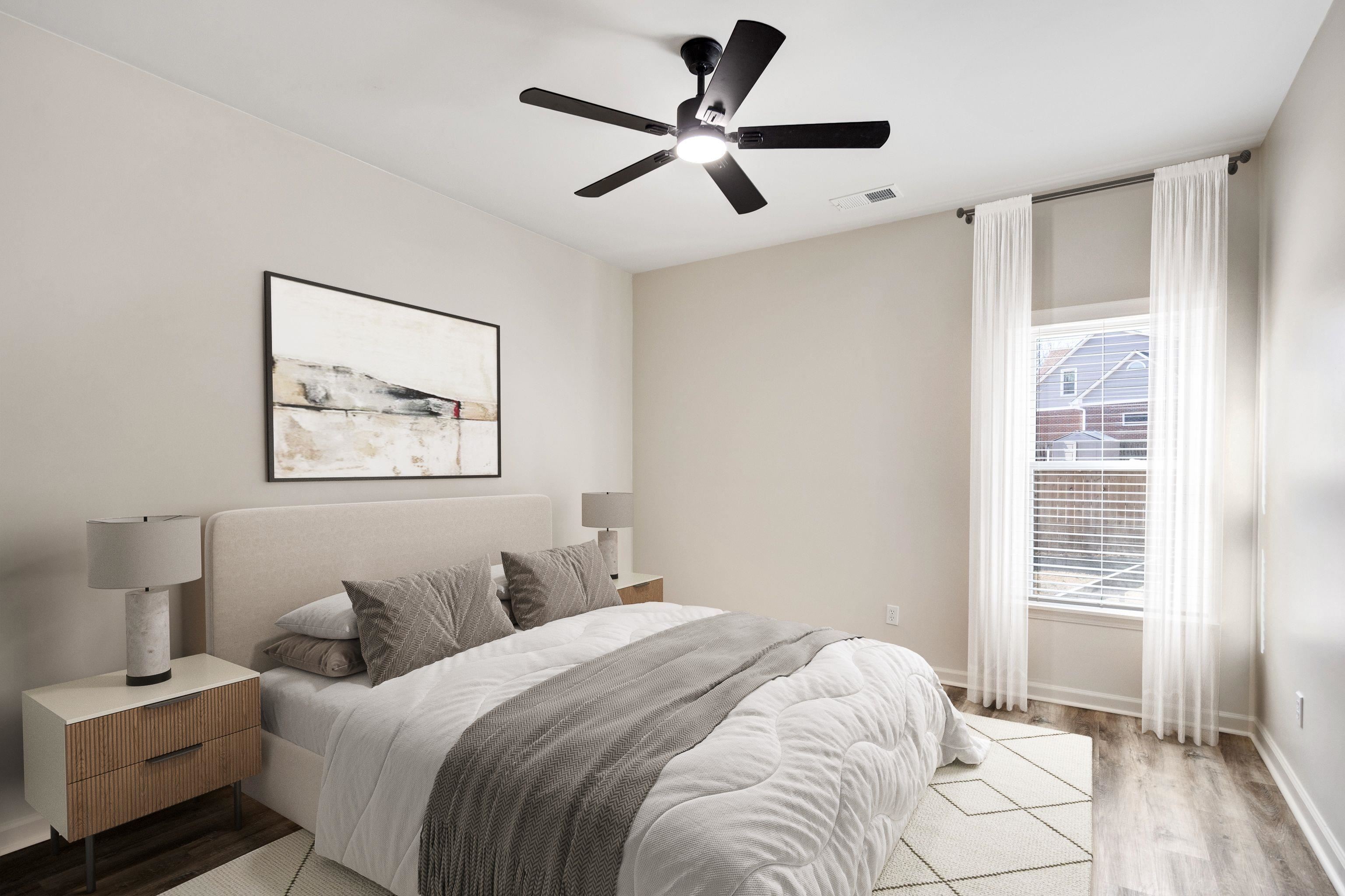 939 Fallen Oaks Drive Collierville, TN 38017 - Photo 16 of 23 a bedroom with a large bed and a window