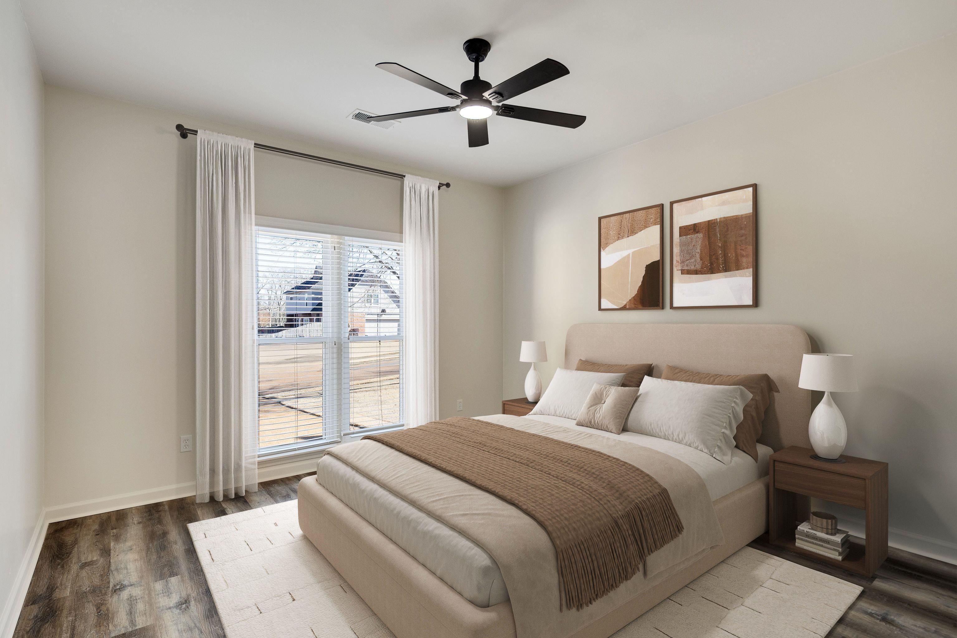 939 Fallen Oaks Drive Collierville, TN 38017 - Photo 18 of 23 a bedroom with a bed and a window