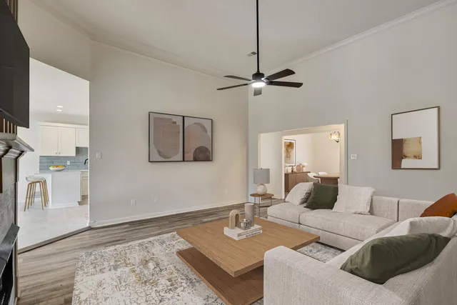 a kitchen with stainless steel appliances a refrigerator sink and cabinets