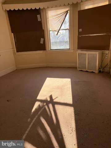 a kitchen with a sink cabinets and a stove top oven