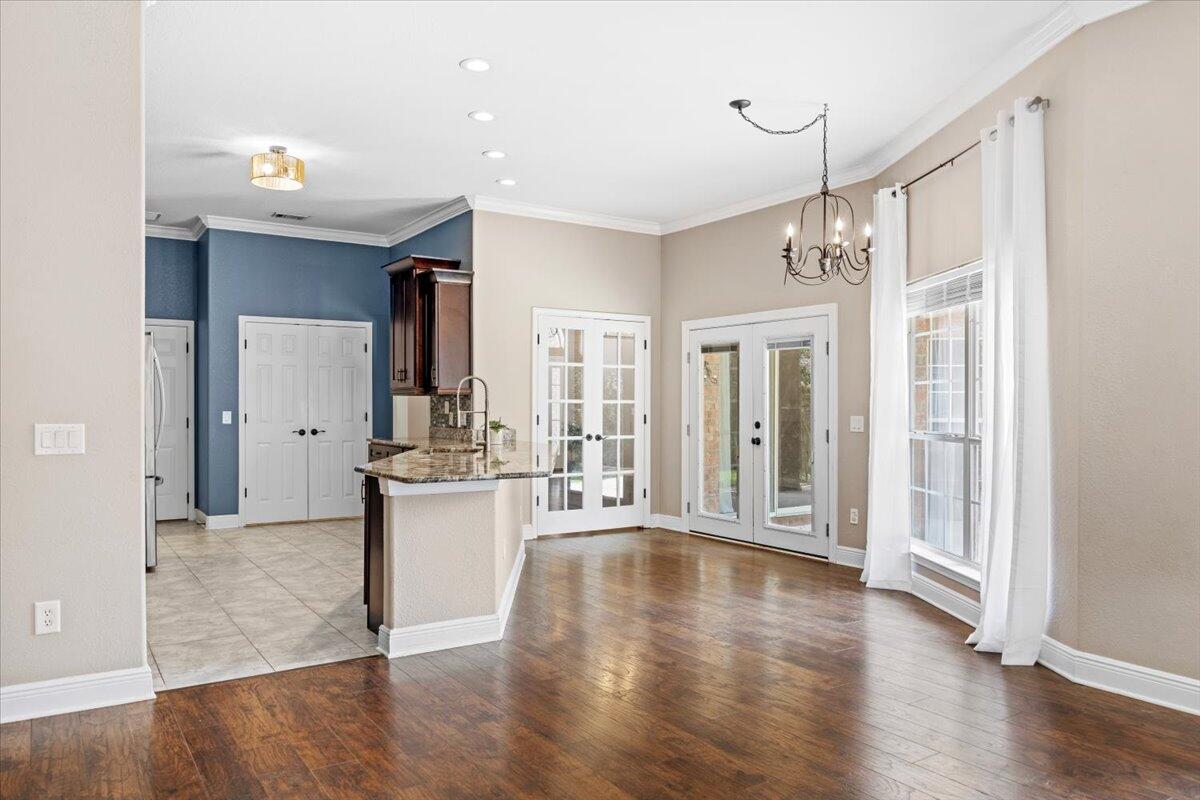 2691 Stormy Circle Navarre, FL 32566 - Photo 20 of 47 a large kitchen with a lot of counter space and wooden floor