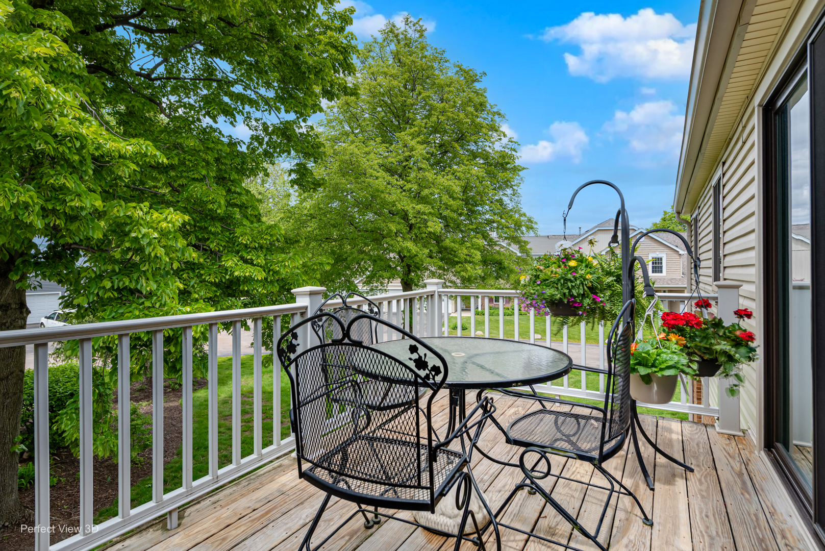 -n120 Windermere Road, Unit 2008 Winfield, IL 60190 - Photo 21 of 23 a table and chairs in the balcony