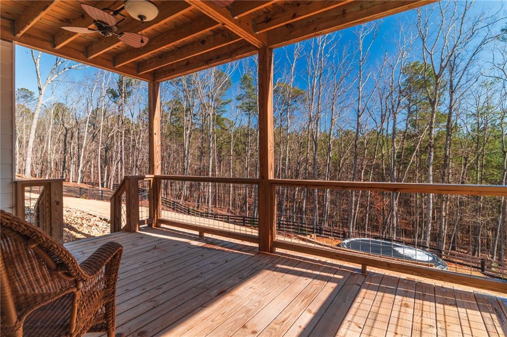 2250 Sperin Road Ball Ground, GA 30107 - Photo 41 of 56 a view of balcony with wooden floor and fence