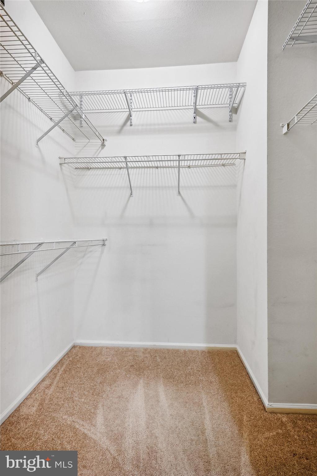 11800 Old Georgetown Road, Unit 1424 Rockville, MD 20852 - Photo 18 of 34 a view of a room with racks on the wall