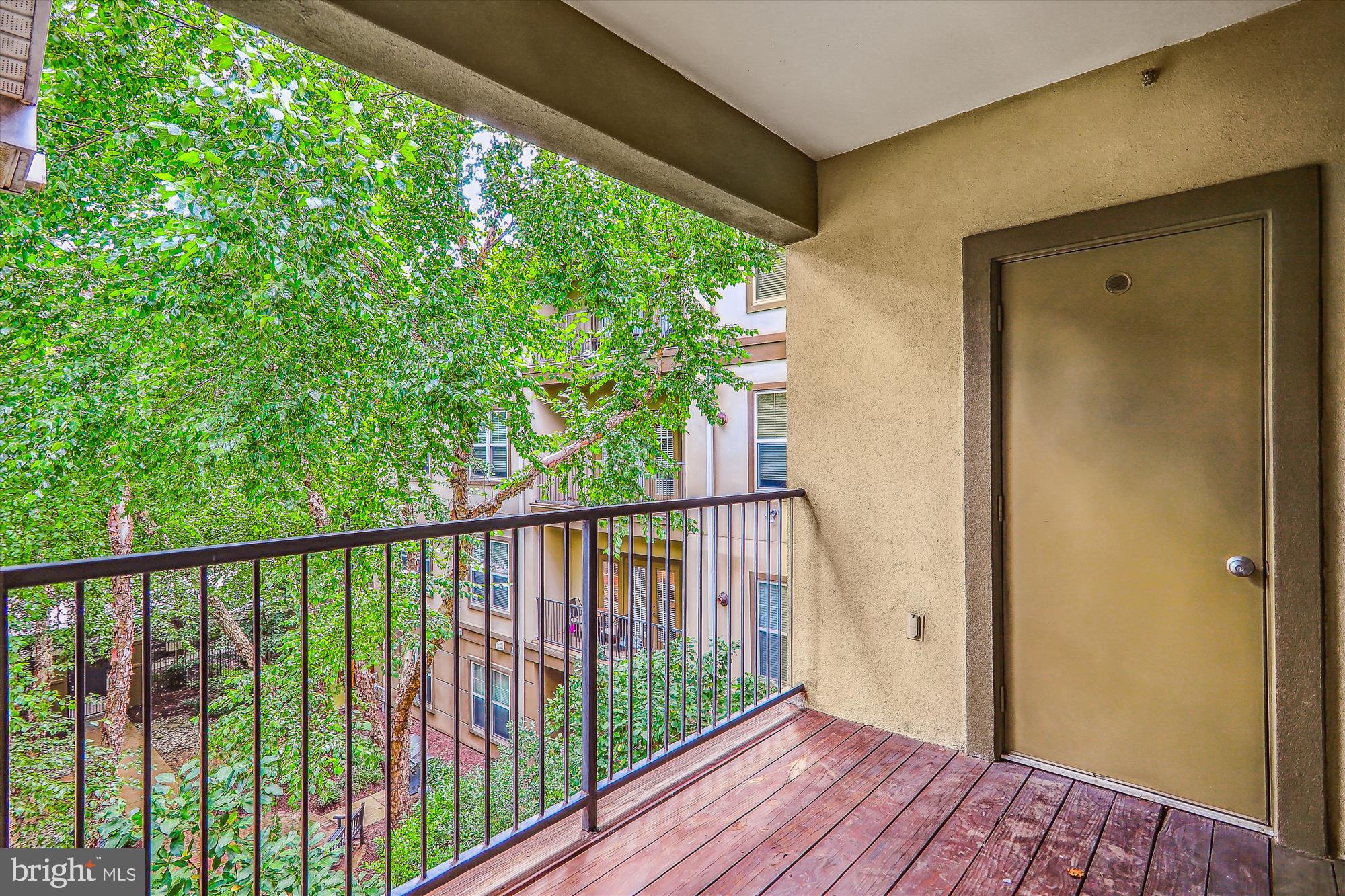 11800 Old Georgetown Road, Unit 1424 Rockville, MD 20852 - Photo 2 of 34 a view of balcony with wooden floor