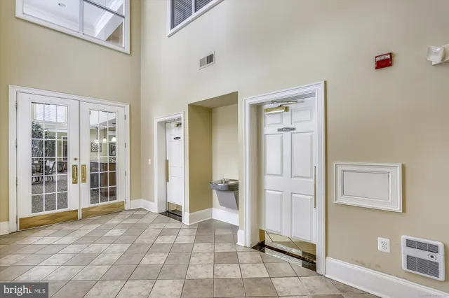 a view of a building with a yard