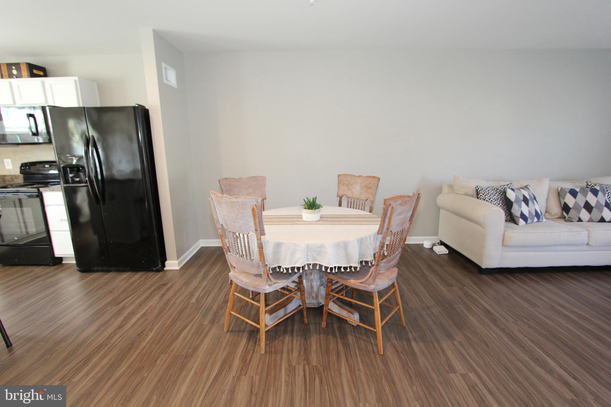 124 Boswell Boulevard Smithsburg, MD 21783 - Photo 11 of 42 Dining room with plank vinyl floors