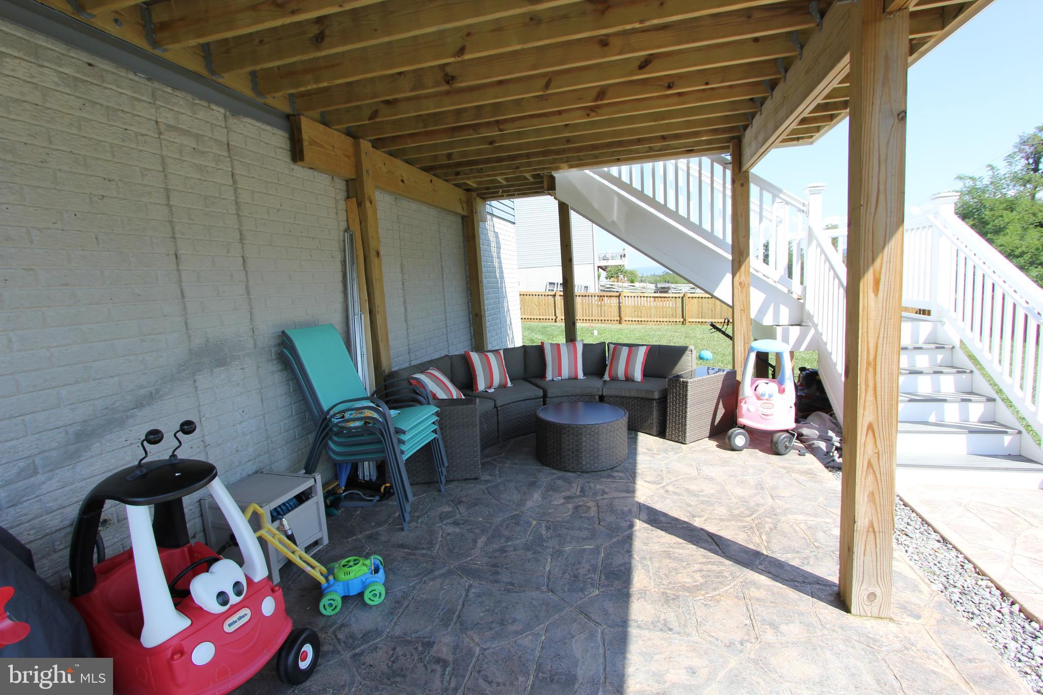 124 Boswell Boulevard Smithsburg, MD 21783 - Photo 36 of 42 Custom paver patio underneath the deck